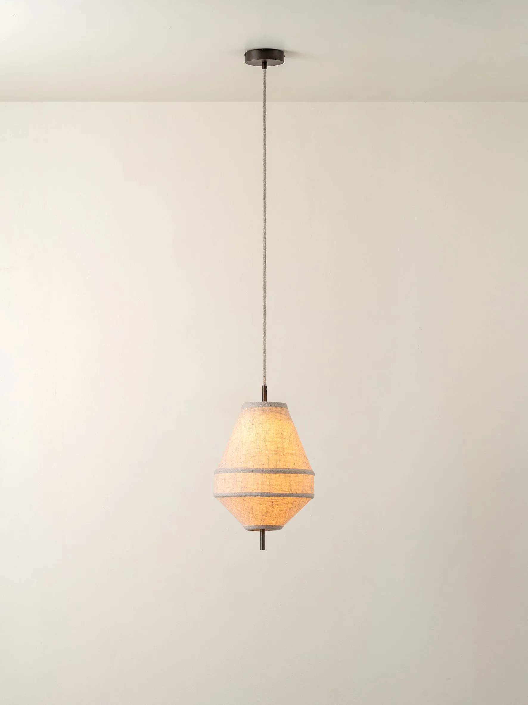 Solara - small dark bronze and layered natural linen pendant
